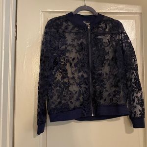 Opaque bomber jacket with navy floral details